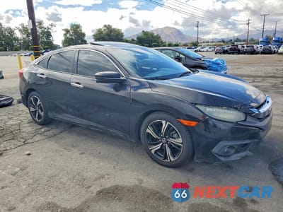 Czwarte zdjęcie samochodu z boku: 2016 HONDA CIVIC TOURING VIN:19XFC1F92GE206080 - miniatura