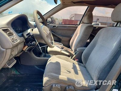 Zdjęcie 13 z 26 samochodu: 1999 HONDA CIVIC LX VIN:2HGEJ6670XH560411 - miniatura