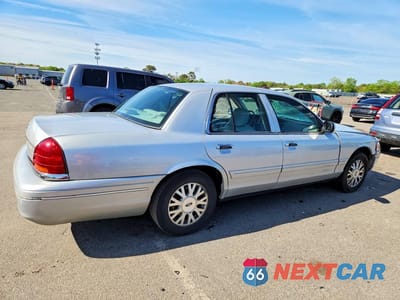 Trzecie zdjęcie samochodu z tyłu: 2003 FORD CROWN VICTORIA LX VIN:2FAFP74W13X156573 - miniatura