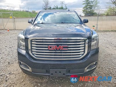 Piąte zdjęcie samochodu w środku: 2019 GMC YUKON SLT VIN:1GKS2BKCXKR186459 - miniatura