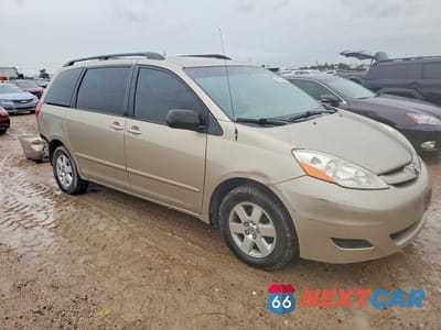 Czwarte zdjęcie samochodu z boku: 2010 TOYOTA SIENNA LE 7-PASSENGER VIN:5TDKK4CC2AS327689 - miniatura