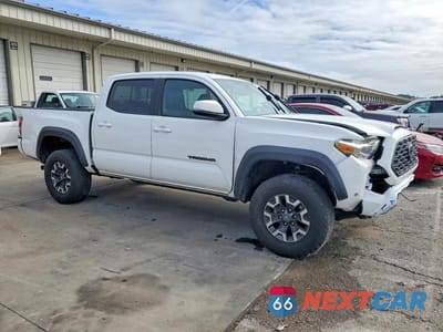 Czwarte zdjęcie samochodu z boku: 2020 TOYOTA TACOMA TRD OFF-ROAD VIN:3TMCZ5AN4LM361579 - miniatura