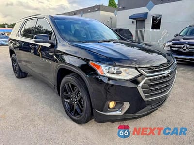 Czwarte zdjęcie samochodu z boku: 2021 CHEVROLET TRAVERSE LT VIN:1GNERGKW7MJ168621 - miniatura