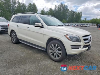 Czwarte zdjęcie samochodu z boku: 2016 MERCEDES-BENZ GL 450 4MATIC VIN:4JGDF6EE2GA642310 - miniatura