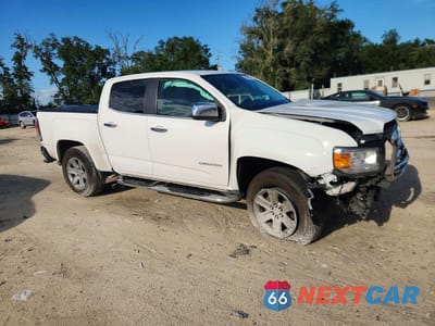 Czwarte zdjęcie samochodu z boku: 2016 GMC CANYON SLT VIN:1GTG5DE3XG1174351 - miniatura