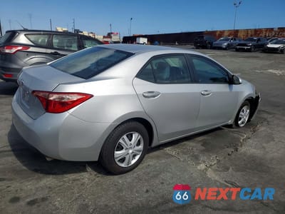 Trzecie zdjęcie samochodu z tyłu: 2017 TOYOTA COROLLA L VIN:5YFBURHE0HP691467 - miniatura