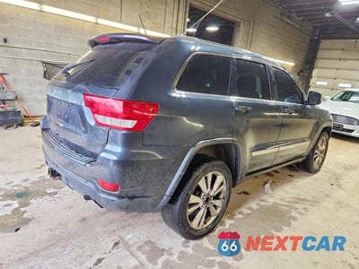 Trzecie zdjęcie samochodu z tyłu: 2012 JEEP GRAND CHEROKEE LAREDO VIN:1C4RJFAG6CC342073 - miniatura
