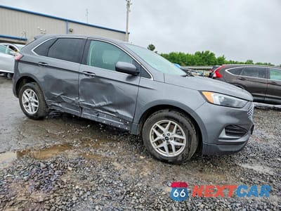 Czwarte zdjęcie samochodu z boku: 2023 FORD EDGE SEL VIN:2FMPK4J97PBA02877 - miniatura