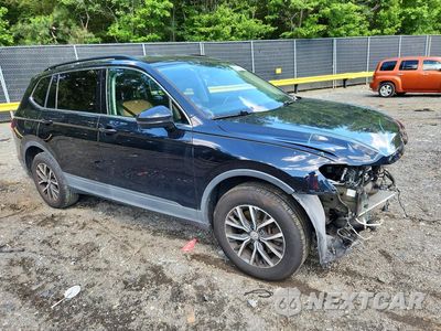 Czwarte zdjęcie samochodu z boku: 2019 VOLKSWAGEN TIGUAN SE VIN:3VV2B7AX4KM134681 - miniatura