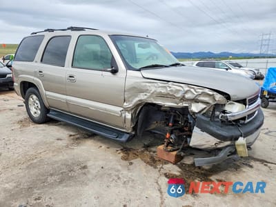 Czwarte zdjęcie samochodu z boku: 2002 CHEVROLET TAHOE K1500 VIN:1GNEK13Z82J249330 - miniatura