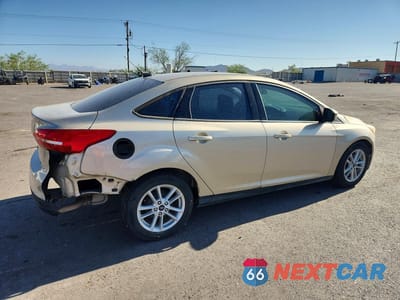 Trzecie zdjęcie samochodu z tyłu: 2018 FORD FOCUS SE VIN:1FADP3F20JL204018 - miniatura