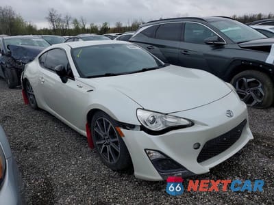 Czwarte zdjęcie samochodu z boku: 2015 SCION FR-S BASE VIN:JF1ZNAA11F8700857 - miniatura
