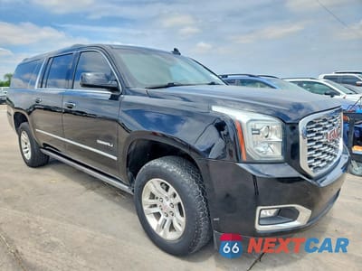 Czwarte zdjęcie samochodu z boku: 2019 GMC YUKON XL DENALI VIN:1GKS1HKJ2KR327190 - miniatura