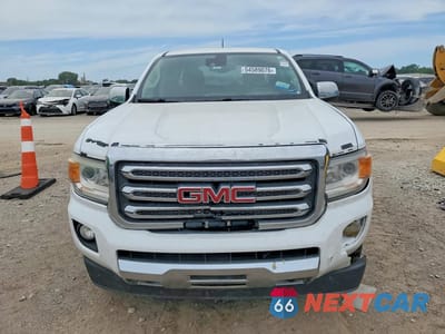 Piąte zdjęcie samochodu w środku: 2015 GMC CANYON SLT VIN:1GTG6CE31F1155516 - miniatura
