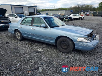 Czwarte zdjęcie samochodu z boku: 2001 FORD CROWN VICTORIA VIN:2FAFP73W91X104476 - miniatura