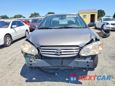 Piąte zdjęcie samochodu w środku: 2004 TOYOTA COROLLA LE VIN:1NXBR32E94Z205285 - miniatura
