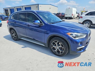 Czwarte zdjęcie samochodu z boku: 2019 BMW X1 XDRIVE28I VIN:WBXHT3C54K5L37167 - miniatura