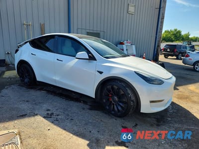 Czwarte zdjęcie samochodu z boku: 2022 TESLA MODEL Y VIN:7SAYGDEF5NF554472 - miniatura