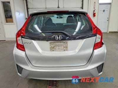Zdjęcie 6 z 13 samochodu: 2015 HONDA FIT LX VIN:3HGGK5H53FM739957 - miniatura