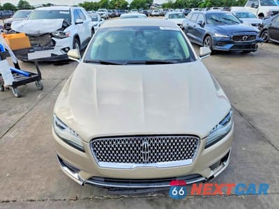 Piąte zdjęcie samochodu w środku: 2017 LINCOLN MKZ SELECT VIN:3LN6L5C99HR660604 - miniatura