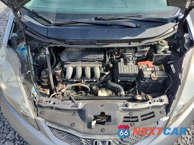 Zdjęcie 11 z 12 samochodu: 2010 HONDA FIT SPORT VIN:JHMGE8H4XAS015535 - miniatura