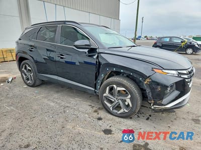 Czwarte zdjęcie samochodu z boku: 2022 HYUNDAI TUCSON SEL VIN:5NMJF3AE1NH004936 - miniatura