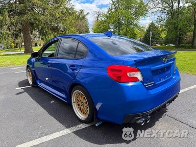 Trzecie zdjęcie samochodu z tyłu: 2017 SUBARU WRX VIN:JF1VA1B60H9810770 - miniatura