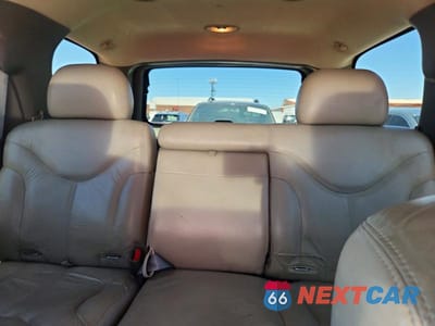 Zdjęcie 10 z 13 samochodu: 2002 GMC YUKON VIN:1GKEC13TX2R206454 - miniatura