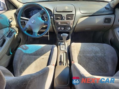 Zdjęcie 8 z 12 samochodu: 2003 NISSAN SENTRA XE VIN:3N1CB51D33L810299 - miniatura