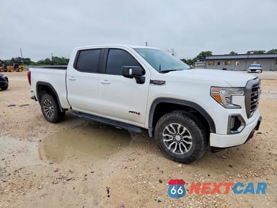 Czwarte zdjęcie samochodu z boku: 2020 GMC SIERRA K1500 AT4 VIN:1GTP9EEL0LZ223983 - miniatura