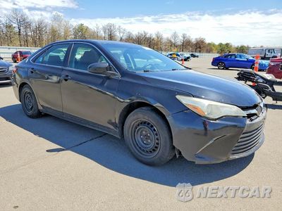 Czwarte zdjęcie samochodu z boku: 2017 TOYOTA CAMRY HYBRID LE VIN:4T1BD1FK0HU220542 - miniatura
