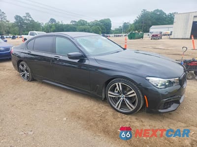 Czwarte zdjęcie samochodu z boku: 2018 BMW 740 I VIN:WBA7E2C57JG743313 - miniatura