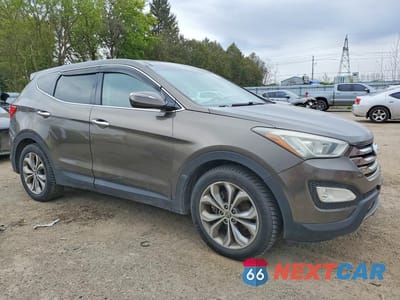 Czwarte zdjęcie samochodu z boku: 2013 HYUNDAI SANTA FE SPORT 2.0T VIN:5XYZUDLA2DG052737 - miniatura