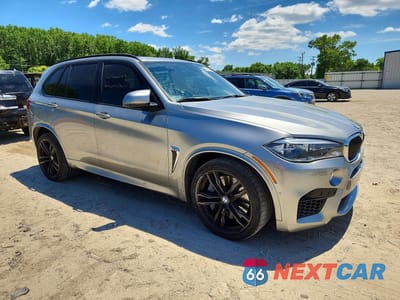 Czwarte zdjęcie samochodu z boku: 2018 BMW X5 M VIN:5YMKT6C53J0X21271 - miniatura