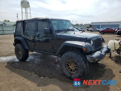 Czwarte zdjęcie samochodu z boku: 2016 JEEP WRANGLER UNLIMITED SPORT VIN:1C4BJWDGXGL204748 - miniatura