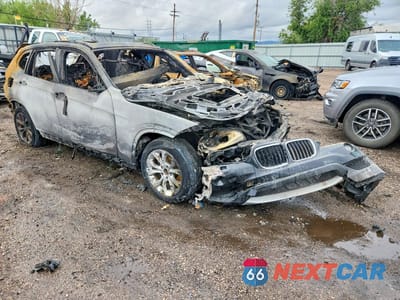 Czwarte zdjęcie samochodu z boku: 2014 BMW X1 XDRIVE28I VIN:WBAVL1C57EVY11540 - miniatura