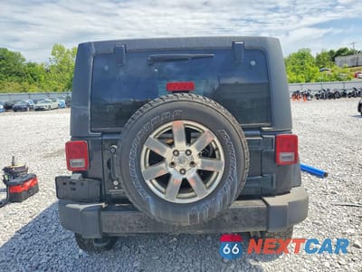 Zdjęcie 6 z 12 samochodu: 2016 JEEP WRANGLER UNLIMITED SAHARA VIN:1C4BJWEG3GL248489 - miniatura