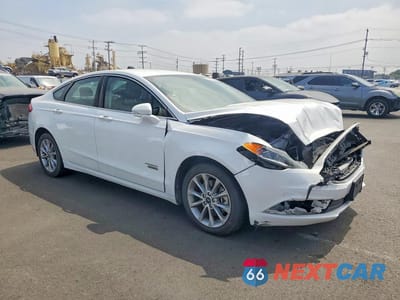 Czwarte zdjęcie samochodu z boku: 2018 FORD FUSION SE PHEV VIN:3FA6P0PU0JR257164 - miniatura