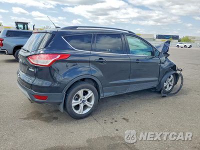Trzecie zdjęcie samochodu z tyłu: 2014 FORD ESCAPE SE VIN:1FMCU0G99EUB13138 - miniatura