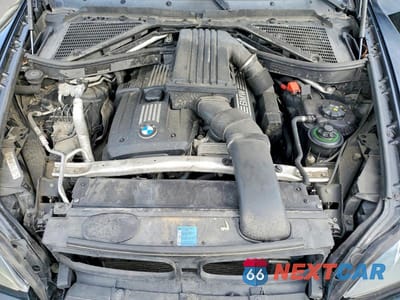 Zdjęcie 12 z 14 samochodu: 2009 BMW X5 XDRIVE30I VIN:5UXFE43539L275107 - miniatura