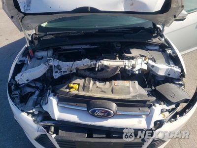 Zdjęcie 11 z 12 samochodu: 2014 FORD FOCUS SE VIN:1FADP3F22EL324778 - miniatura