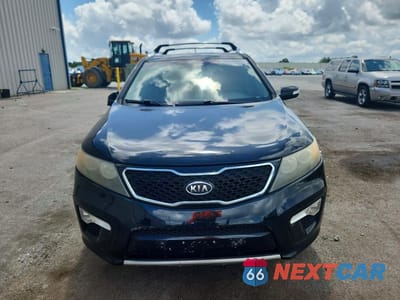 Piąte zdjęcie samochodu w środku: 2011 KIA SORENTO SX VIN:5XYKWDA23BG121584 - miniatura