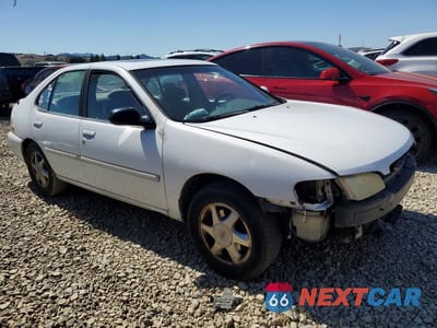 Czwarte zdjęcie samochodu z boku: 1999 NISSAN ALTIMA XE VIN:1N4DL01D9XC140993 - miniatura