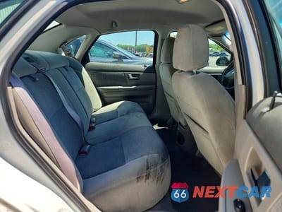 Zdjęcie 10 z 12 samochodu: 2000 FORD TAURUS SES VIN:1FAFP5528YG140741 - miniatura