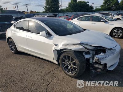 Czwarte zdjęcie samochodu z boku: 2018 TESLA MODEL 3 VIN:5YJ3E1EA2JF023207 - miniatura