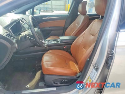 Zdjęcie 7 z 12 samochodu: 2019 FORD FUSION TITANIUM VIN:3FA6P0D92KR138548 - miniatura