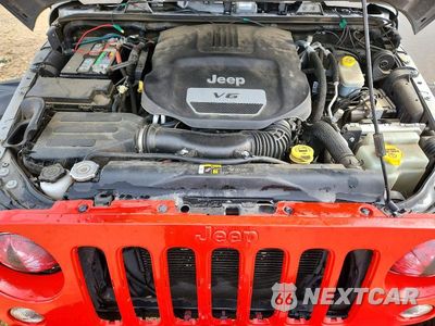 Zdjęcie 12 z 13 samochodu: 2018 JEEP WRANGLER UNLIMITED SAHARA VIN:1C4HJWEG7JL929269 - miniatura