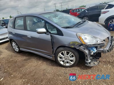 Czwarte zdjęcie samochodu z boku: 2009 HONDA FIT SPORT VIN:JHMGE88429S012091 - miniatura