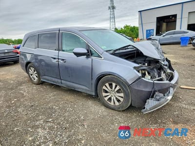 Czwarte zdjęcie samochodu z boku: 2014 HONDA ODYSSEY EXL VIN:5FNRL5H66EB074147 - miniatura
