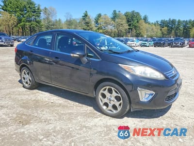 Czwarte zdjęcie samochodu z boku: 2011 FORD FIESTA SEL VIN:3FADP4CJ2BM113043 - miniatura